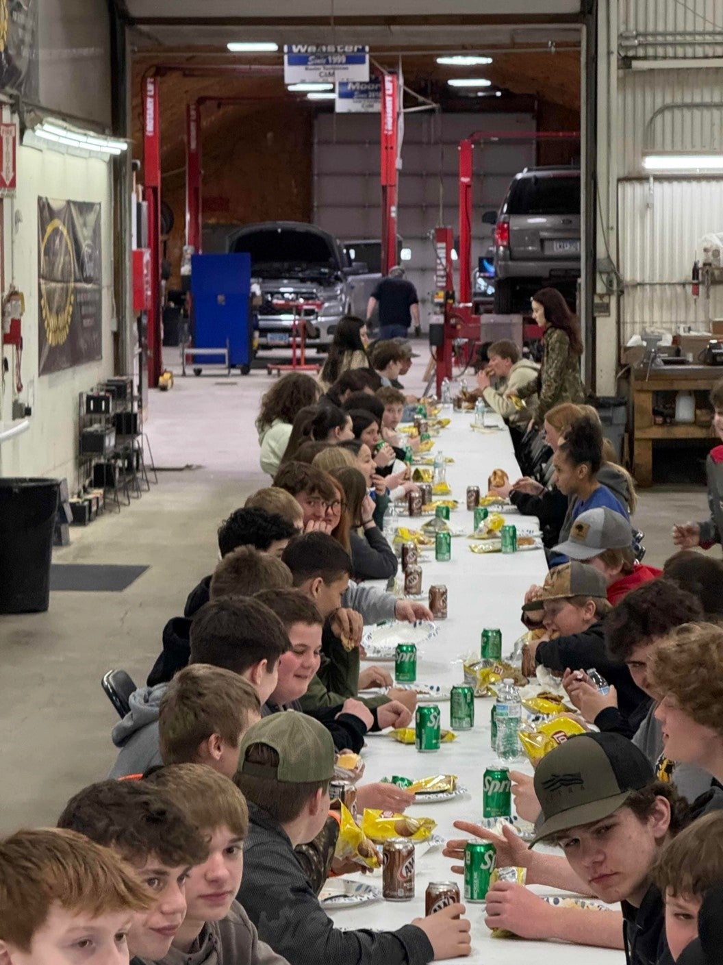 Students eating lunch at Tech Day 2025 in the shop at C&M